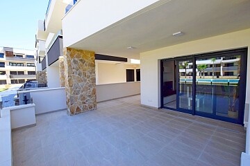 Ruim modern 2-slaapkamer appartement met groot terras in Playa Flamenca  in Ole International