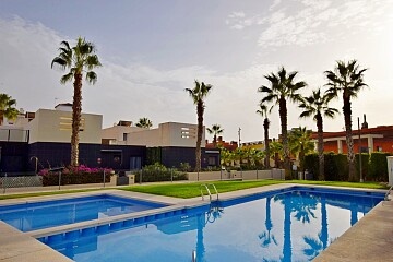 Spacious modern 2 beds semidetached villa with large garden by the pool in Villamartin in Ole International