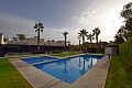 Spacious modern 2 beds semidetached villa with large garden by the pool in Villamartin in Ole International