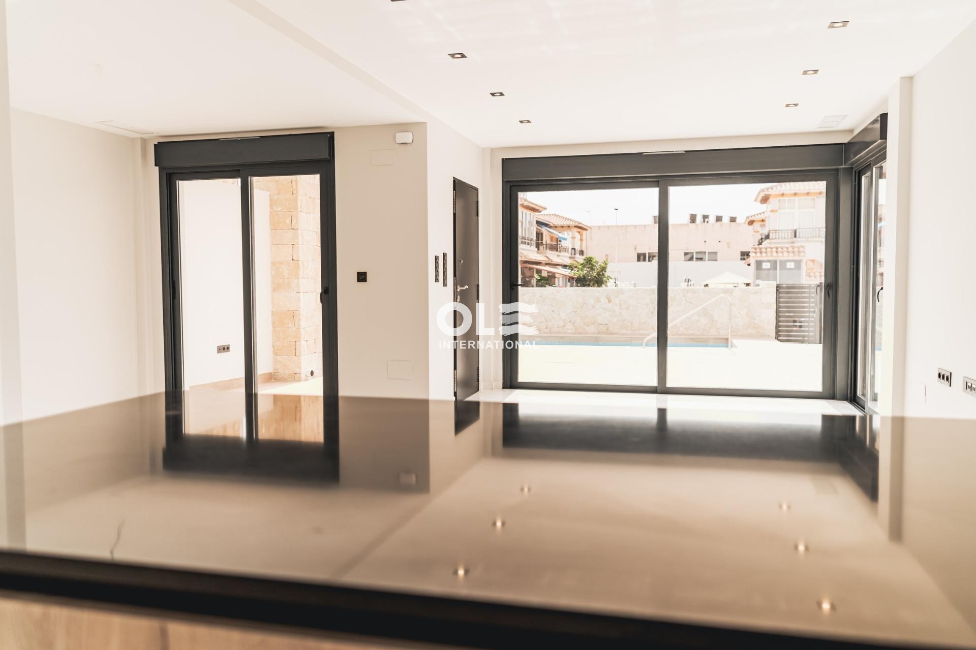 Новое здание - Villa - Orihuela Costa - Punta Prima